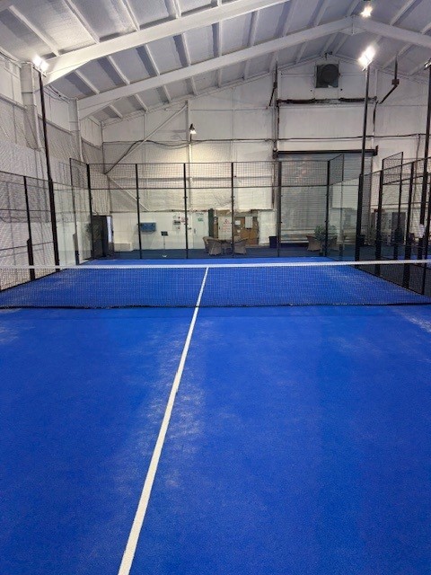 Floodlit indoor padel courts at Poplars Padel in East Cowick near Goole
